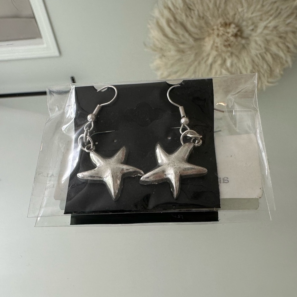 Silver starfish drop earrings